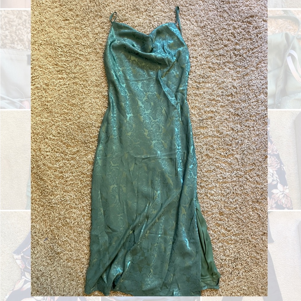 small sage green lulus mid shin length dress with slit on left leg